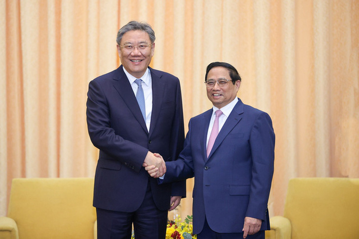 Thủ tướng Phạm Minh Chính và Bộ trưởng Thương mại Trung Quốc - Ảnh: VGP