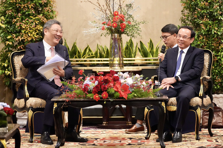 Bí thư Nguyễn Văn Nên tiếp Bộ trưởng Thương mại Trung Quốc Vương Văn Đào, ngày 25-11 - Ảnh: HỮU HẠNH
