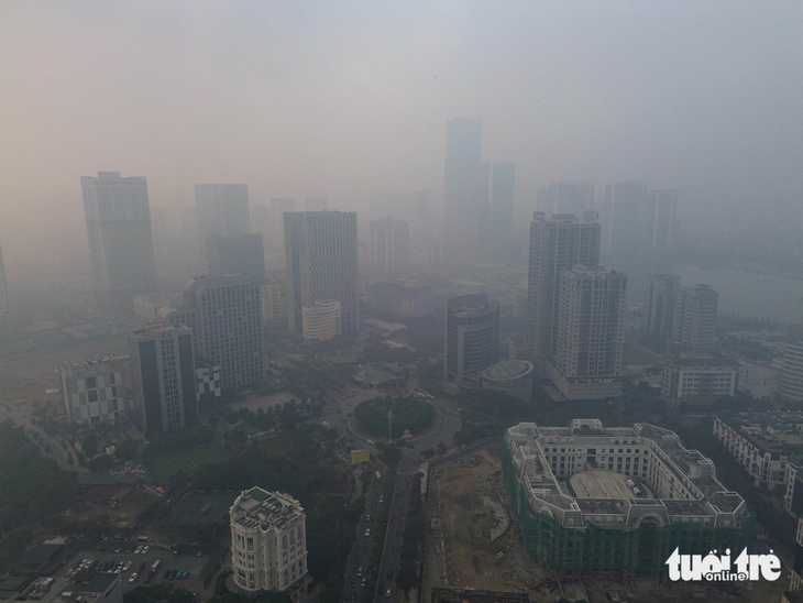 Bầu trời Hà Nội mù đặc, ô nhiễm không khí tệ thứ 2 thế giới- Ảnh 10.