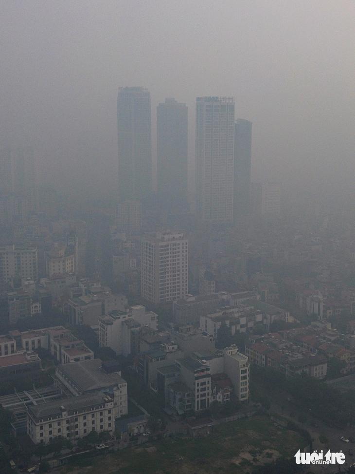 Bầu trời Hà Nội mù đặc, ô nhiễm không khí tệ thứ 2 thế giới- Ảnh 12.