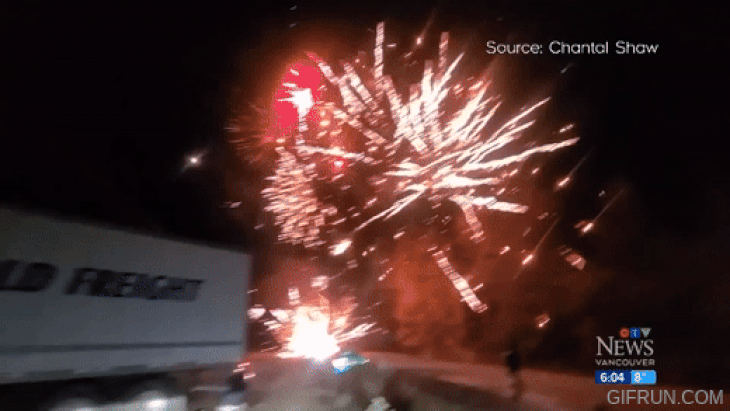 Passersby have to reluctantly watch the fireworks show and wait for it to end before safely moving on - photo cut from video, source: CBC News