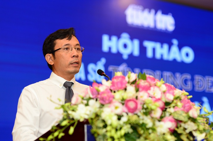 Nhà báo Trần Xuân Toàn, phó tổng biên tập báo Tuổi Trẻ, phát biểu tại hội thảo - Ảnh: QUANG ĐỊNH