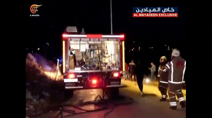 Hình ảnh cắt từ đoạn băng của Al-Mayadeen Tv mà Hezbollah cho là hiện trường vụ Israel không kích làm chết một người phụ nữ và 3 bé gái ở Lebanon - Ảnh: REUTERS