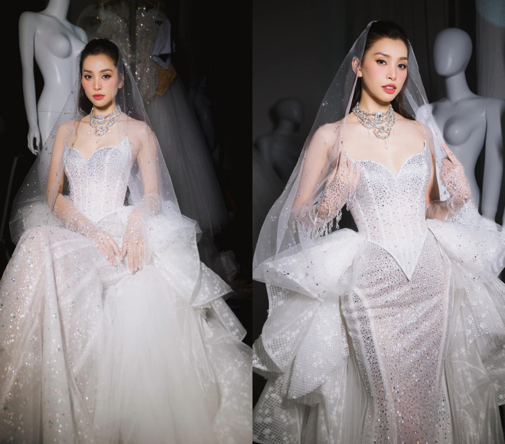 Hình ảnh mẫu váy cưới lộng lẫy Tiểu Vy trình diễn trong sự kiện