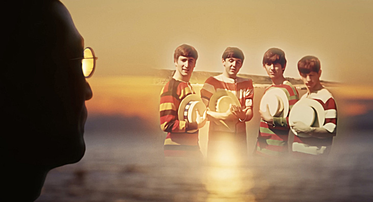 Hình ảnh John Lennon hướng mắt về các thành viên The Beatles thời trẻ trong MV Now and Then - Ảnh: YouTube The Beatles