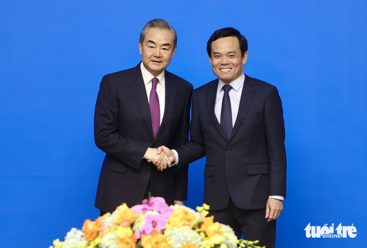 Phó thủ tướng Trần Lưu Quang và Ngoại trưởng Trung Quốc Vương Nghị tại cuộc họp ngày 1-12 - Ảnh: NGUYỄN KHÁNH