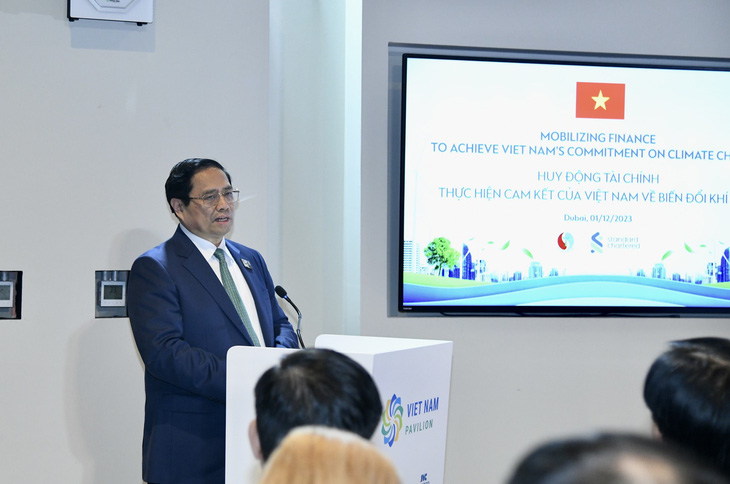 Thủ tướng Phạm Minh Chính chia sẻ tại sự kiện huy động tài chính thực hiện cam kết của Việt Nam - Ảnh: N.AN
