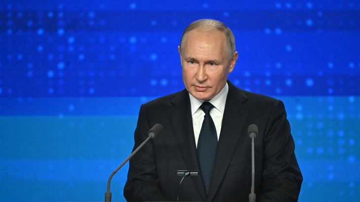 Tổng thống Nga Vladimir Putin tại đại hội lần thứ XXI của Đảng Nước Nga thống nhất hôm 17-12 - Ảnh: RIA NOVOSTI