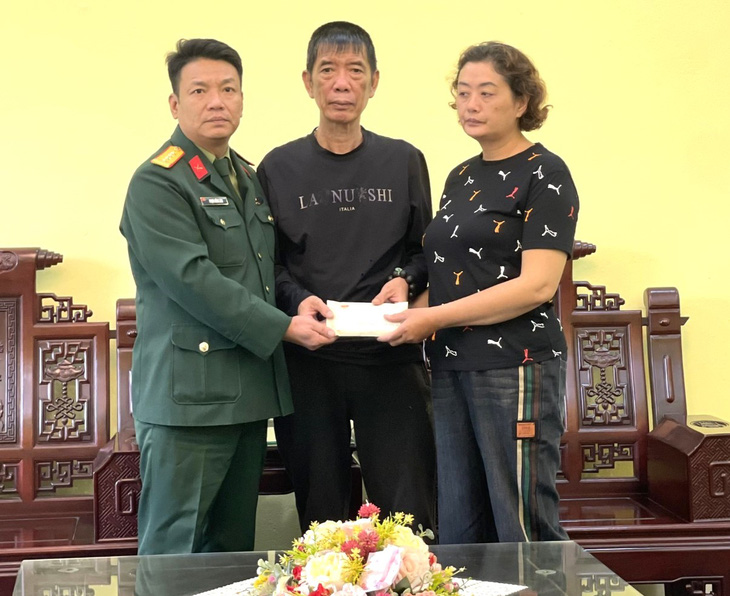 Ngành thể thao Quân Đội thăm hỏi, động viên gia đình Nguyễn Minh Triết - Ảnh: TDDC VN
