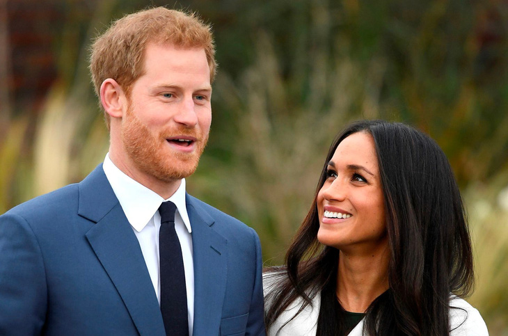 Hoàng tử Harry và vợ Meghan Markle - Ảnh: Reuters