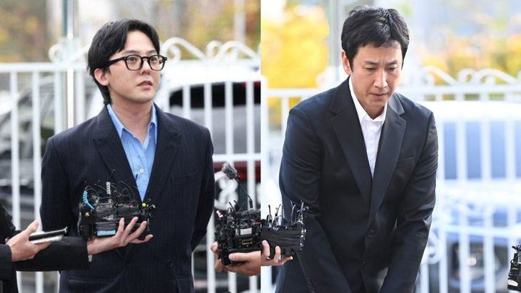 G-Dragon (trái) và diễn viên Lee Sun Kyun trình diện cảnh sát - Ảnh: Yonhap News/ Dispatch