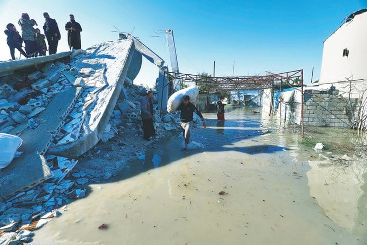 Động đất gây lũ cuốn trôi một ngôi làng ở Syria, nhiều di tích lịch sử hư hại - Ảnh 1.