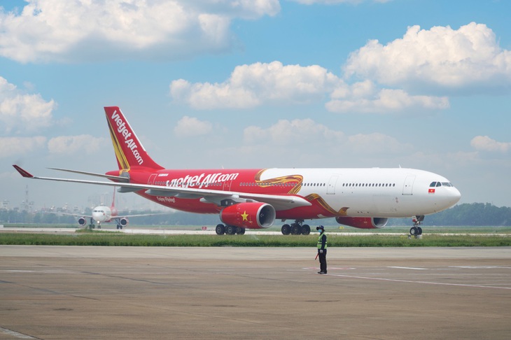 Lợi nhuận tăng cao, Vietjet đi đầu mở đường bay quốc tế, thúc đẩy du lịch, đầu tư. - Ảnh 1. Lợi nhuận tăng cao, Vietjet đi đầu mở đường bay quốc tế, thúc đẩy du lịch, đầu tư. - Ảnh 1.