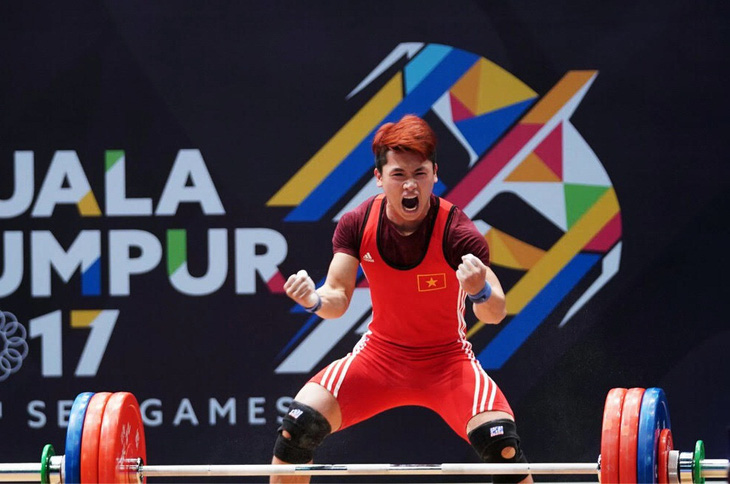 Lực sĩ Trịnh Văn Vinh trở lại sau 4 năm bị cấm thi đấu vì doping - Ảnh 1.