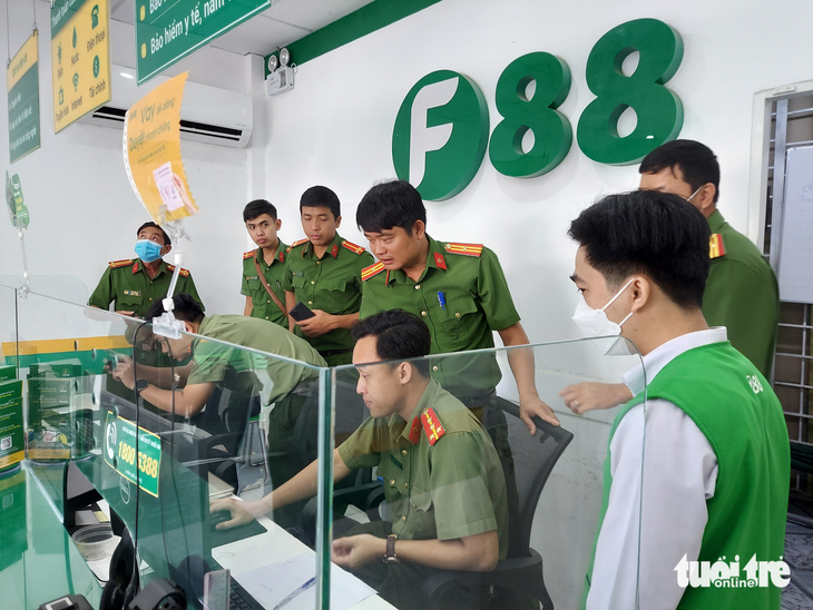 Công an tỉnh Đồng Tháp kiểm tra 16 phòng giao dịch của F88 - Ảnh 1.