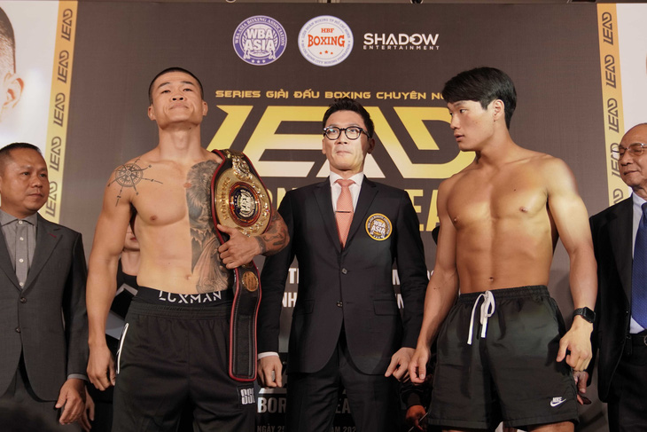 Trương Đình Hoàng, Lê Hữu Toàn bảo vệ đai WBA châu Á - Ảnh 1.