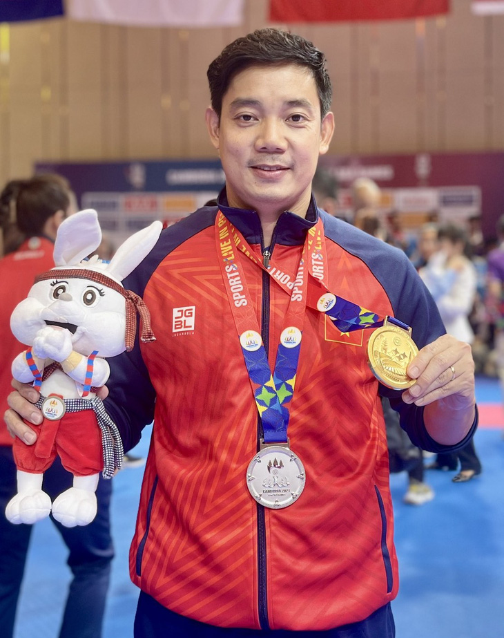 Giáo viên thể dục ở TP.HCM đoạt 2 huy chương tại SEA Games 32 - Ảnh 1.