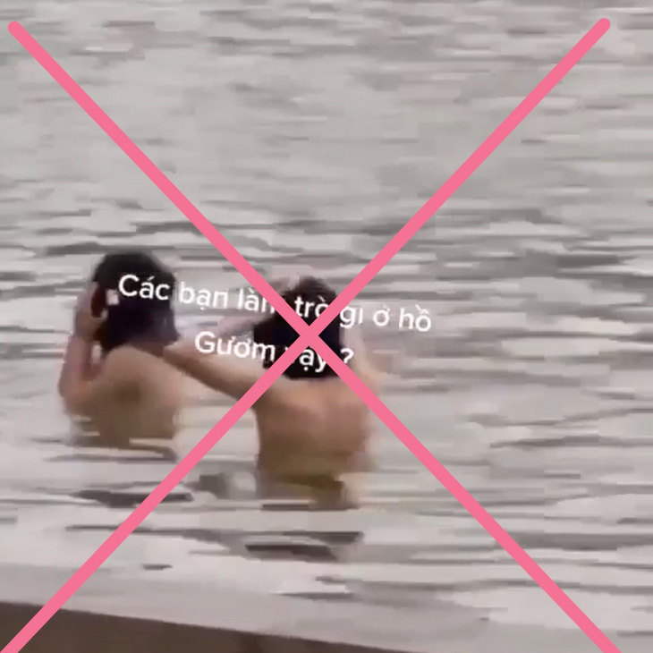 2 cô gái cởi trần tắm ở hồ Gươm là cắt ghép, sẽ xử lý người đăng clip - Ảnh 1.