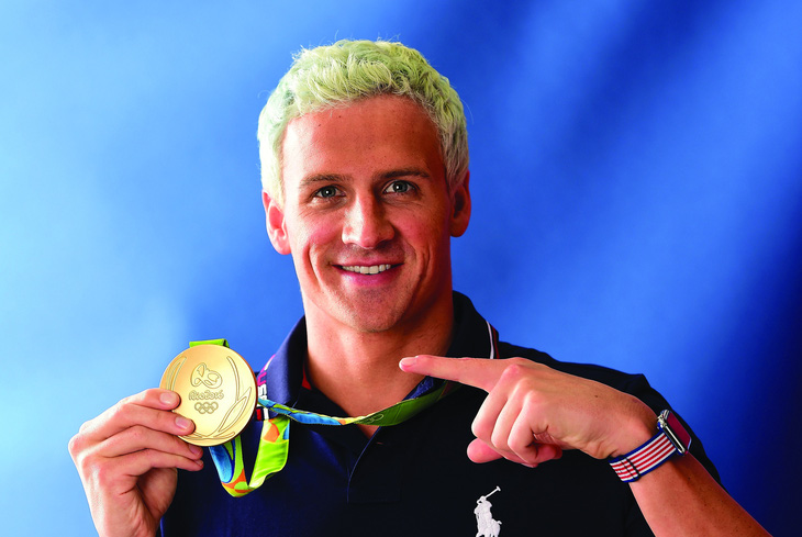Kình ngư Ryan Lochte lách luật để quảng cáo cho nhà tài trợ riêng ở Olympic. Ảnh: Getty Images
