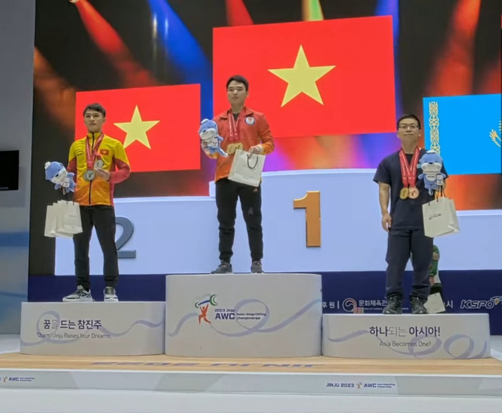 Đỗ Tú Tùng đoạt 2 HCV ở Giải vô địch cử tạ châu Á 2023 - Ảnh 1.