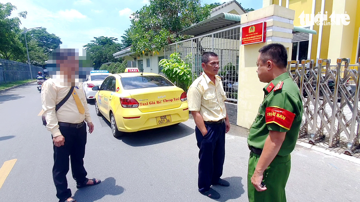 Tài xế taxi của Công ty cổ phần tập đoàn vận tải Sài Gòn lắp thiết bị gian lận bị xử lý - Ảnh: MINH HÒA