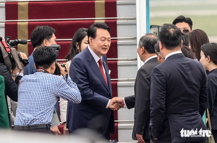 Tổng thống Hàn Quốc bắt đầu thăm chính thức Việt Nam - Ảnh 4.