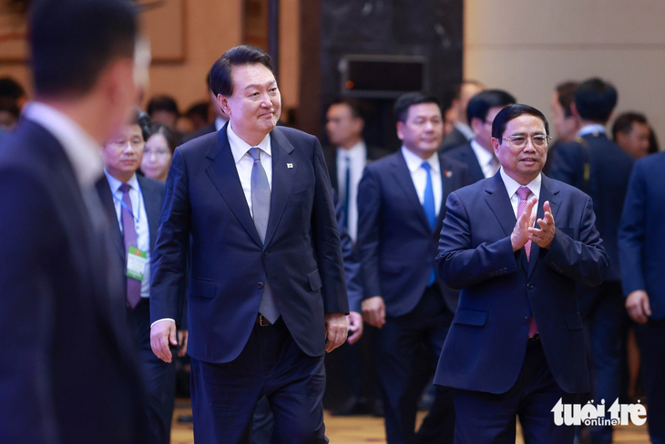 Tổng thống Hàn Quốc và Thủ tướng Phạm Minh Chính tham dự Diễn đàn Doanh nghiệp Việt Nam - Hàn Quốc - Ảnh: NGUYỄN KHÁNH