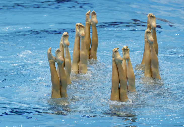 Đây là phần thi kỹ thuật đồng đội của đội tuyển Pháp ngày 18-7 ở phần thi Bơi nghệ thuật trong khuôn khổ Giải vô địch các môn thể thao dưới nước thế giới 2023 diễn ra từ ngày 14-30/7 tại thành phố Fukuoka, Nhật Bản. (Reuters) 