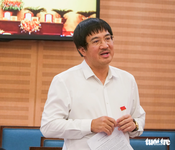 Đại biểu Phạm Đình Đoàn - chủ tịch Tập đoàn Phú Thái (đại biểu huyện Mê Linh) - phát biểu tại buổi họp tổ - Ảnh: PHẠM TUẤN