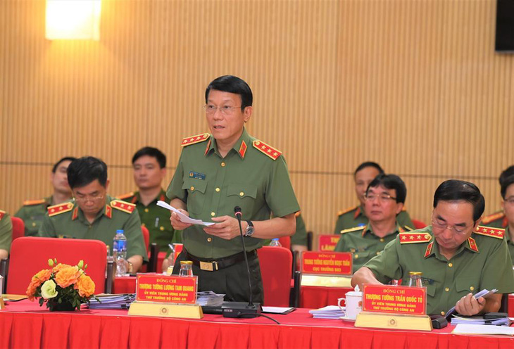 Thượng tướng Lương Tam Quang, thứ trưởng Bộ Công an, trình bày báo cáo tại hội nghị - Ảnh: Bộ Công an