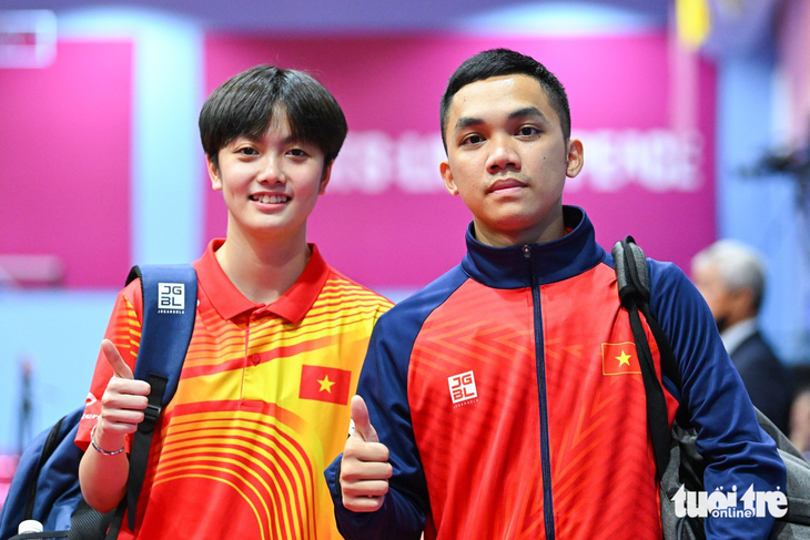 Trần Mai Ngọc (trái) và Đinh Anh Hoàng không thể tái hiện phong độ từng giúp họ vô địch SEA Games 32 - Ảnh: NAM TRẦN