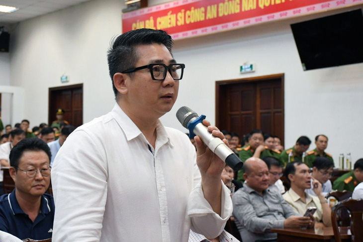 Ông Lê Quốc Thanh, tổng giám đốc điều hành Tập đoàn Phong Thái, trình bày tại buổi đối thoại - Ảnh: H.M.