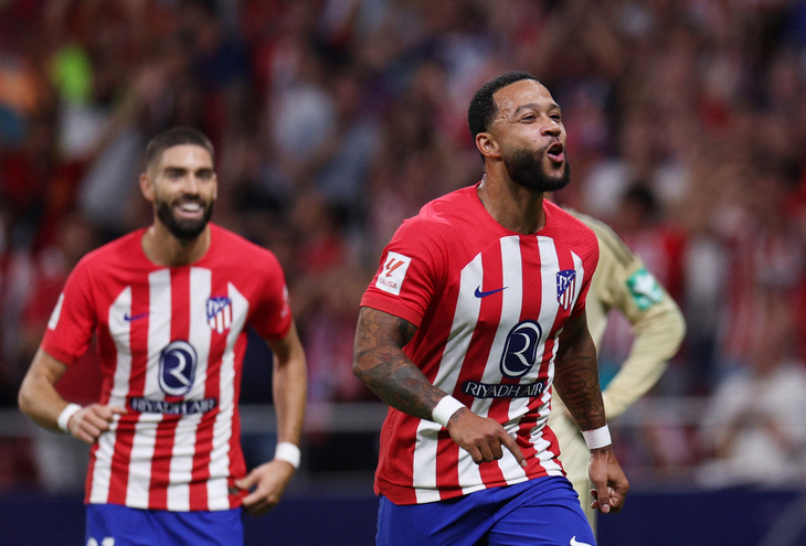 Atletico Madrid ăn mừng chiến thắng trước Granada - Ảnh: Reuters