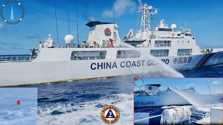 Lực lượng tuần duyên Philippines công bố hình ảnh tàu hải cảnh Trung Quốc xịt vòi rồng vào tàu tiếp tế của Manila ở bãi Cỏ Mây - Ảnh: AFP