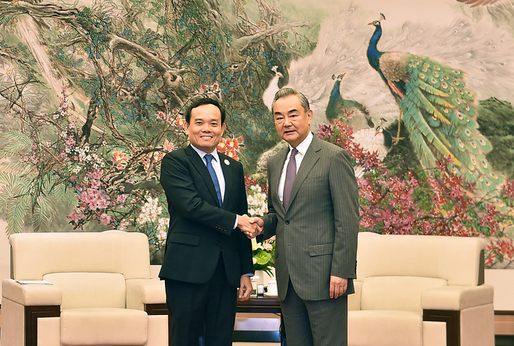 Phó thủ tướng Trần Lưu Quang trong cuộc gặp Ngoại trưởng Trung Quốc Vương Nghị hồi tháng 8-2023 - Ảnh: TTXVN