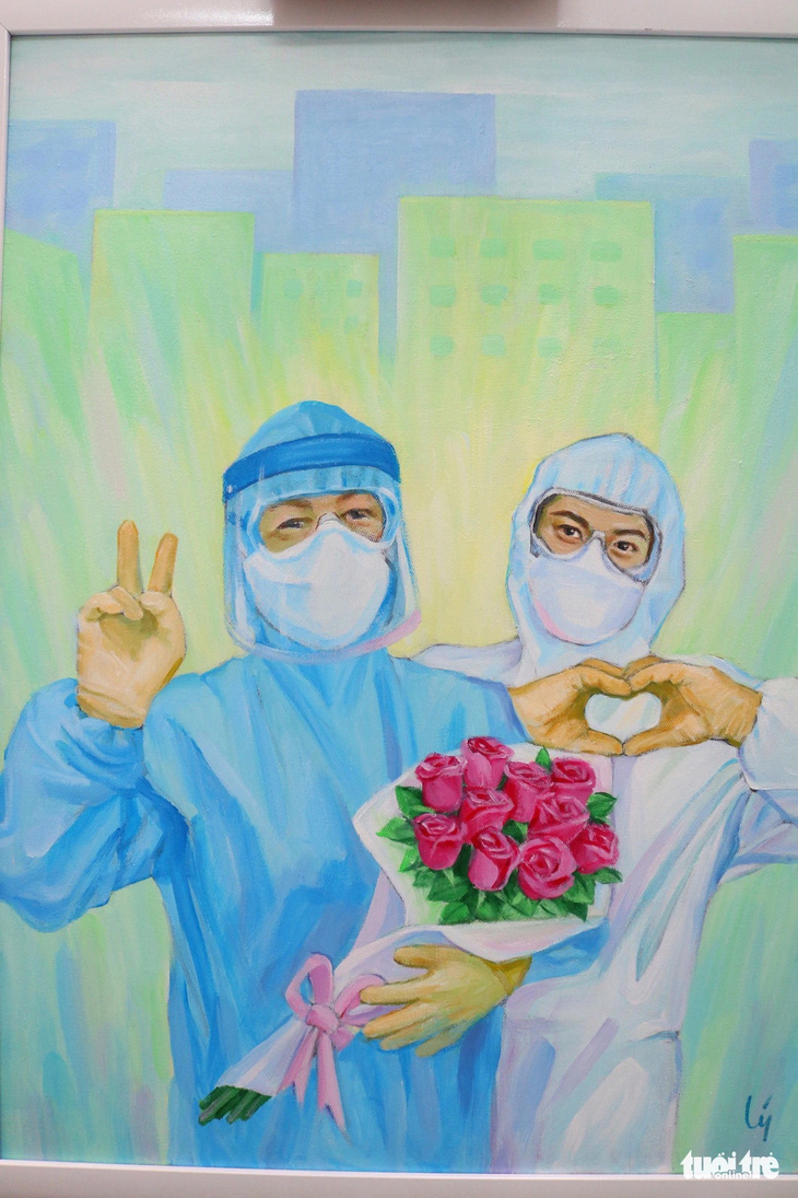 Bức tranh cổ động "Tri ân ngành y" của ông Trần Minh Lý (62 tuổi, quận 2, TP.HCM) tiếp thêm tinh thần, tri ân đội ngũ trên tuyến đầu chống dịch COVID-19 - Ảnh: NGỌC PHƯỢNG