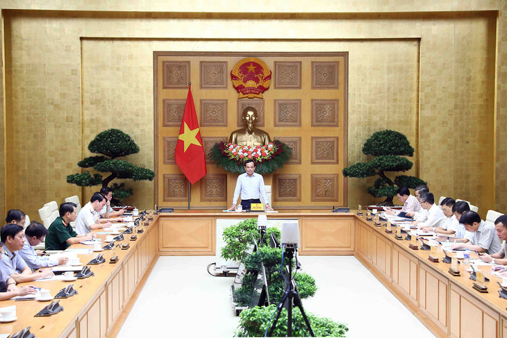Phó thủ tướng Trần Lưu Quang chủ trì cuộc họp - Ảnh: Báo Chính phủ