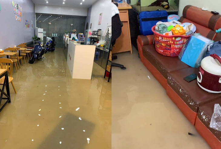 Nhiều nhà dân, hộ kinh doanh ở hai bên đường Võ Nguyên Giáp bị nước tràn vào nhà - Ảnh: THU HẰNG