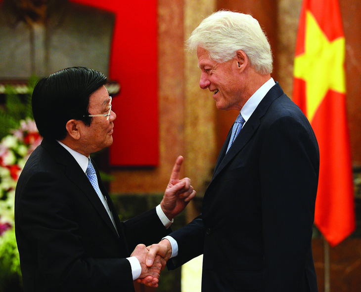 Tổng thống Mỹ Bill Clinton và Chủ tịch nước Trương Tấn Sang. Ảnh: CNN
