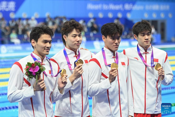 Đội bơi tiếp sức Trung Quốc tại Asiad 19 (từ trái sang): Xu Jiayu, Qin Haiyang, Wang Changhao và Pan Zhanle - Ảnh: XINHUA
