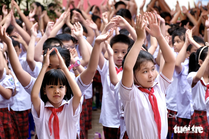 Học sinh dự lễ khai giảng năm học 2023-2024 tại Hà Nội - Ảnh: NGUYÊN BẢO