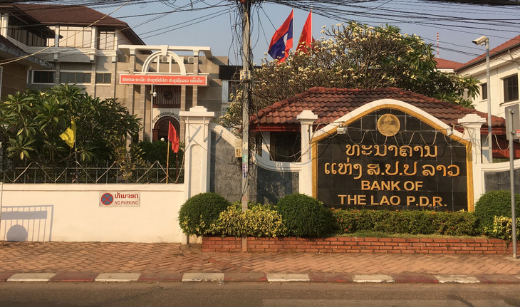 Nhà đầu tư nước ngoài phải mở tài khoản ngân hàng tại Lào- Ảnh 1.
