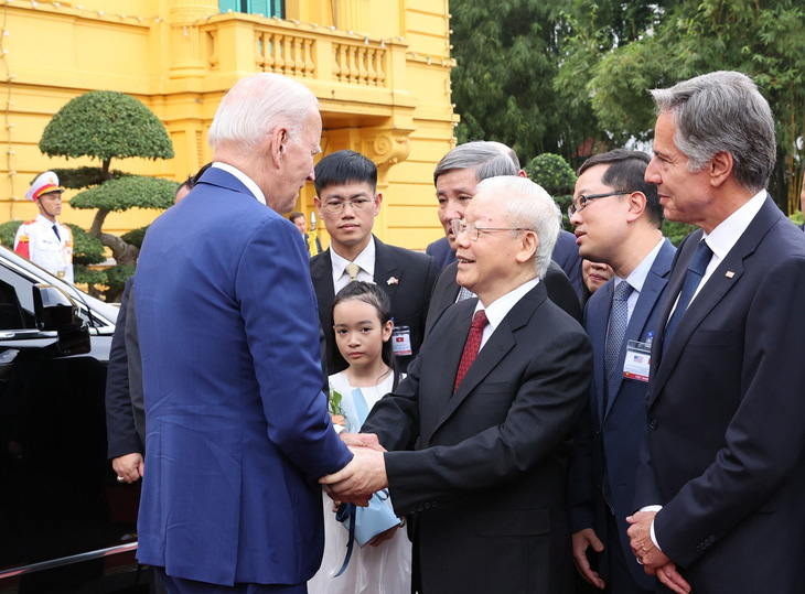 Tổng bí thư Nguyễn Phú Trọng đón Tổng thống Mỹ Joe Biden. Ảnh: TTXVN