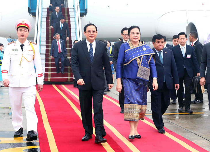 Đây là chuyến thăm chính thức Việt Nam đầu tiên của ông Sonexay Siphandone trên cương vị Thủ tướng Lào - Ảnh: TTXVN