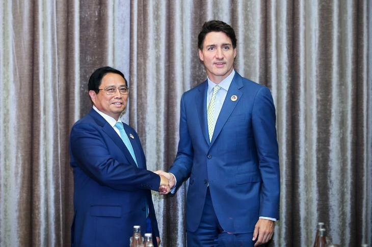 Thủ tướng gặp Thủ tướng Canada, Malaysia, New Zealand, Chủ tịch Hội đồng châu Âu tại Lào - Ảnh 1.