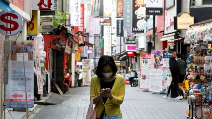 bile-phone-amid-social-distancing-measures-to-avoid-the-spread-of-the-coronavirus-disease-covid-19-in-myeongdong-shopping-district-in-seoul-1-17295197467601579379164.jpeg