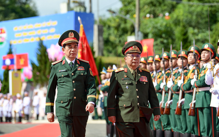 Quân đội hai nước Việt Nam - Lào hợp tác chặt chẽ ngăn chặn các loại tội phạm xuyên quốc gia - Ảnh 4.