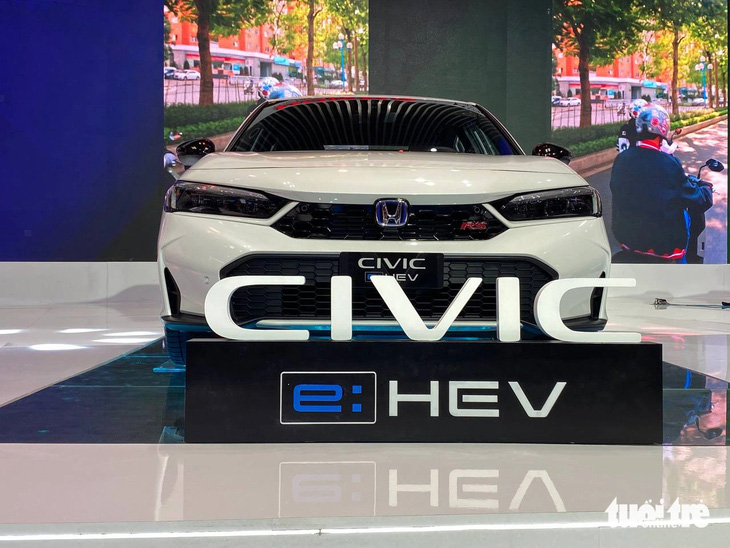 Honda Civic 2024 ra mắt Việt Nam: Giá cao nhất 999 triệu đồng, 8 cảm biến, động cơ hybrid 200 mã lực - Ảnh 8.