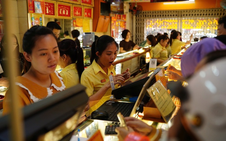 Kiên trì chống vàng hóa nền kinh tế - Ảnh 4.