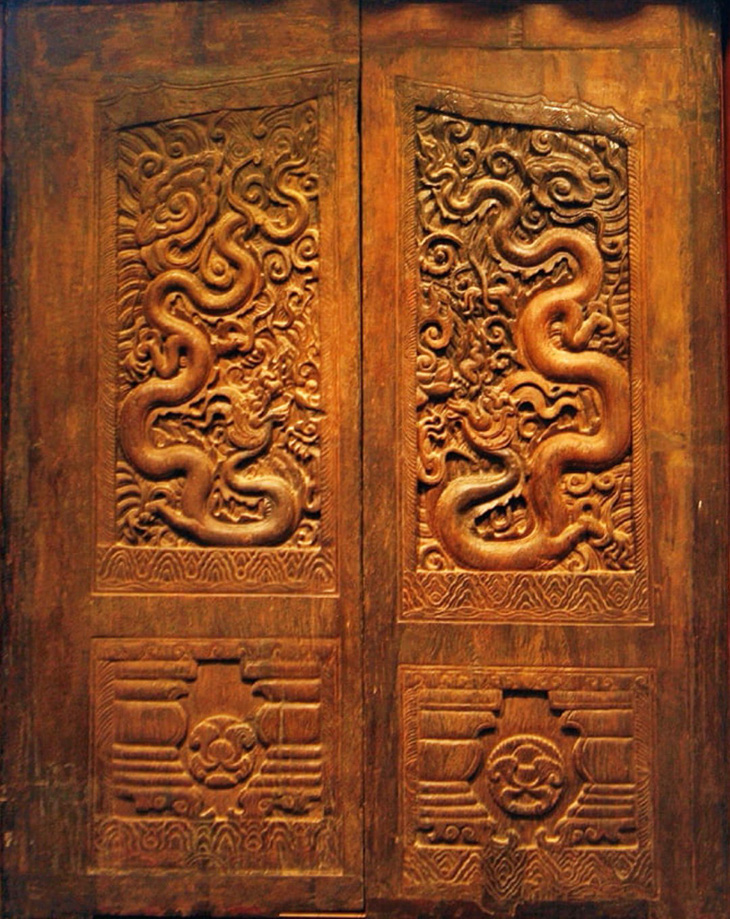 Hoa văn rồng trên bộ cánh cửa chùa Phổ Minh đời Trần - Ảnh: Bảo tàng tỉnh Nam Định
